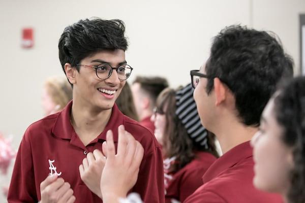 students interact at an orientation event
